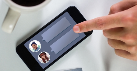 Digital composite of Messaging App on phone and hand with chat profilesの写真素材
