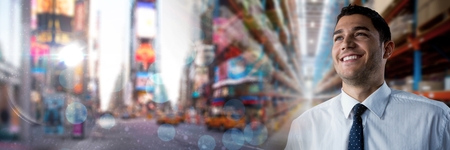 Digital composite of Businessman smiling successfully in warehouse with city transitionの写真素材
