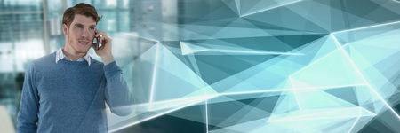 Digital composite of Businessman on phone in modern office with polygon transition