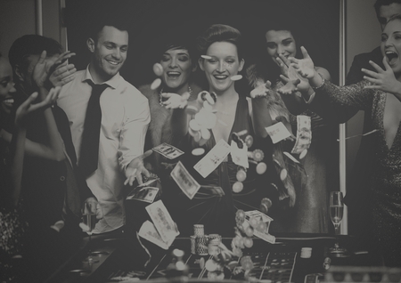 Digital composite of People playing in casinoの写真素材