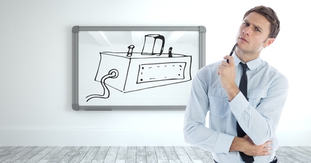 Digital composite of Sketch of machine and man thinkingの写真素材