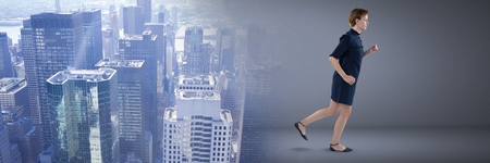 Digital composite of Businesswoman in room running with city transitionの写真素材