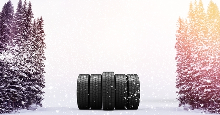 Digital composite of Composed image of trees with snow and wheelsの写真素材