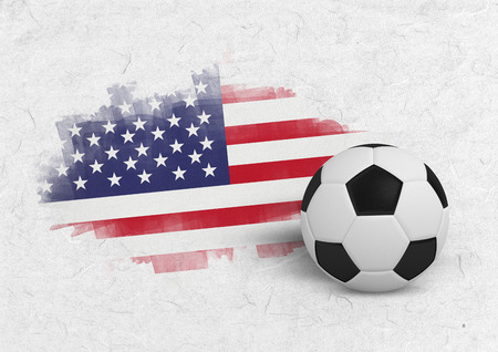 Black and white football against parchmentの写真素材