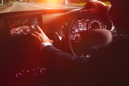 close-up of man using navigation systemの写真素材