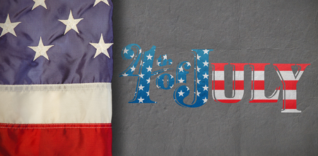 Creased US flag against greyの写真素材