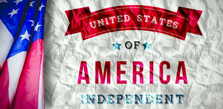 Creased US flag against crumpled white pageの写真素材