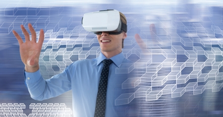 Digital composite of Man wearing virtual reality headset with geometric transition