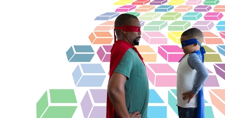 Digital composite of Father and son superheroes with colorful geometric pattern