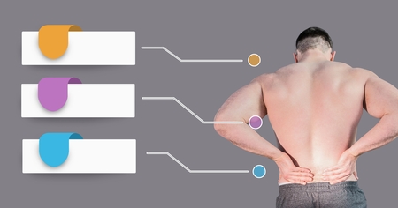 Digital composite of Man holding back pain with blank infographic chart panels