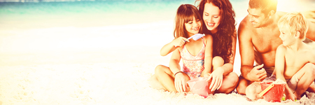Portrait of a family at the beachの写真素材