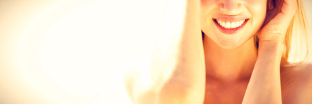 beautiful blonde woman on a sunny day at the beachの写真素材