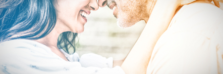 Close-up of happy couple embracing outdoorsの写真素材