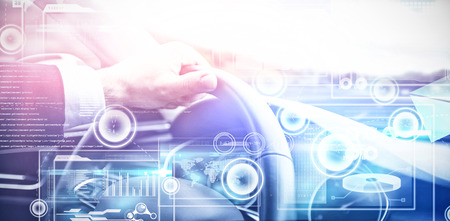 Business interface against close-up of steering wheel