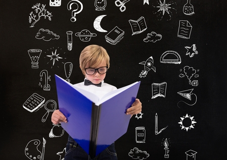 Digital composite of School boy and Education drawing on blackboard for schoolの写真素材