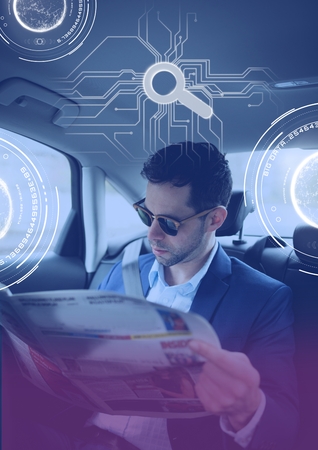 Digital composite of Man in driverless autonomous car with heads up display interface  and paperの写真素材