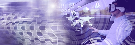 Digital composite of Man driving in car with heads up display interface  and virtual reality headset and transitionの写真素材