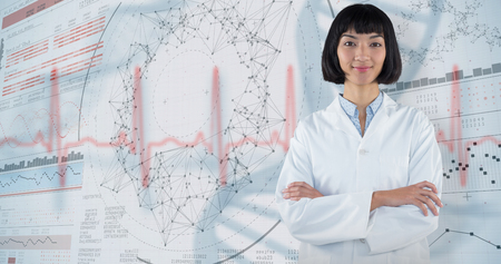 Doctor standing with arms crossed against white background against genes diagram on white backgroundの写真素材