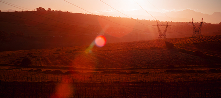 The evening electricity pylon silhouetteの写真素材