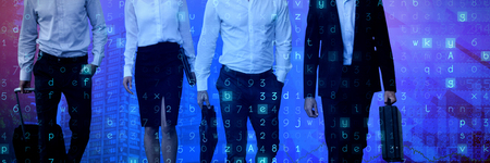 Low section of business people against stocks and sharesの写真素材