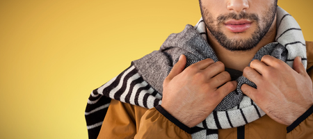 Man posing against white background against abstract yellow backgroundの写真素材