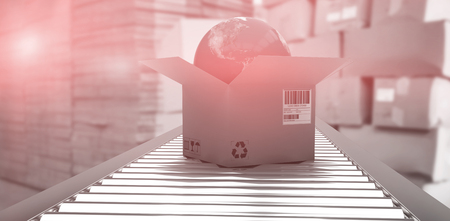 Box with globe on 3D conveyor belt against red carの写真素材