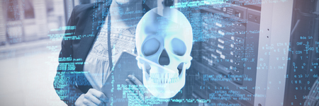 Blue codes against blue human skullの写真素材