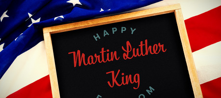 happy Martin Luther King freedom against blank slate on national flagの写真素材