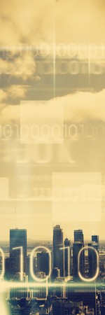 Blue technology design with binary code against view of city skylineの写真素材