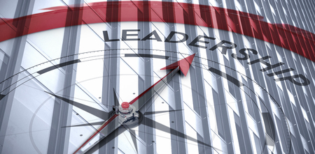Compass pointing to leadership against close-up of glass office buildingの写真素材