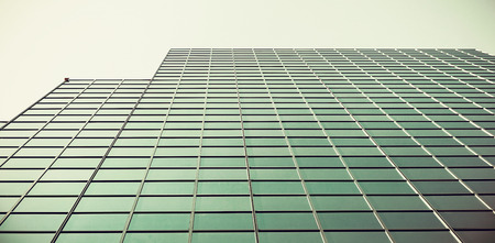 Digitally altered view of modern office buildingの写真素材