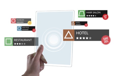 Tablet with Applications  held by handの写真素材