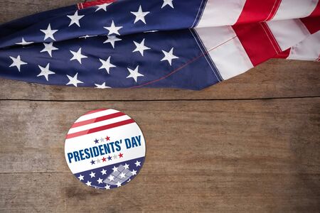 presidents day. Vector typography, stars against american flag on a wooden tableの写真素材