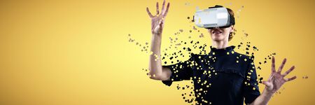 Businesswoman working with VR against abstract yellow background