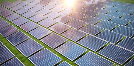 Blue solar panels against grassの写真素材