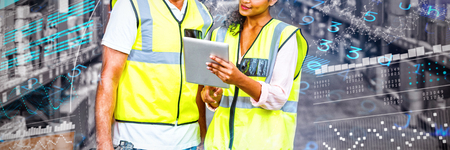 genes diagram on white background against warehouse workers discussing with digital tablet