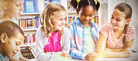 Kids interacting with each other in library at school