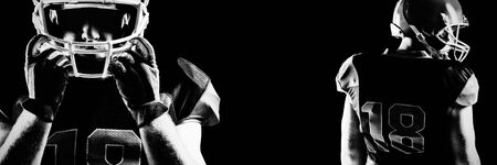 Close-up of American football player standing in rugby helmetの写真素材