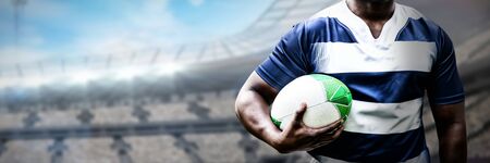 Strong Rugby Player against rugby stadiumの写真素材