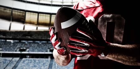 American Football Player against rugby goal post in a stadium Front view of rugby goal post in a empty stadiumの写真素材