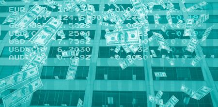 Dollars falling against blue dataの写真素材