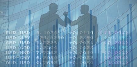 Silhouettes shaking hands against blue dataの写真素材