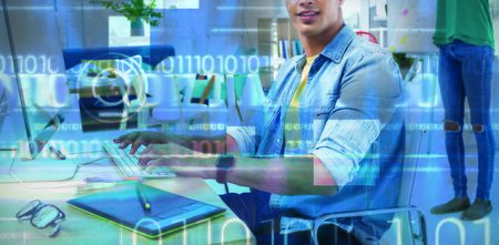 Blue technology design with binary code against portrait of male executive with colleague using...