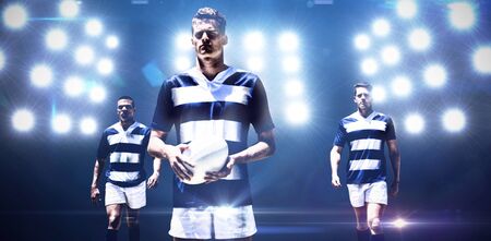 Rugby Player against composite image of spotlightの写真素材