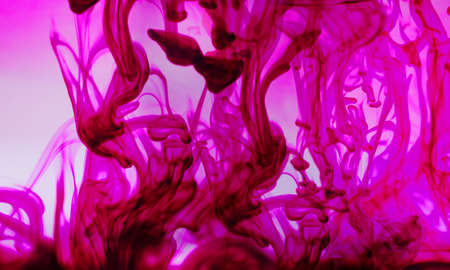 Abstract illustration of pink color acrylic ink in water against white background. background with abstract texture conceptの写真素材