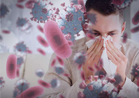 Composition of covid 19 cells over sick man blowing his nose. global coronavirus pandemic and health...