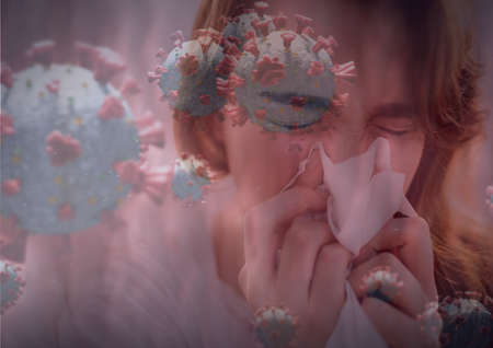 Composition of covid 19 cells over sick woman blowing her nose. global coronavirus pandemic and health concept digitally generated image.の写真素材