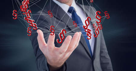 Composition of network of digital legal paragraph icons over hand of male lawyer or businessman....
