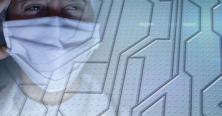 Metal machine pert over a caucasian female medical worker, healthcare and technology concept....