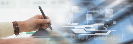 Digital screen over a woman using graphics tablet, technology and corporate concepts. digitally generated imageの写真素材